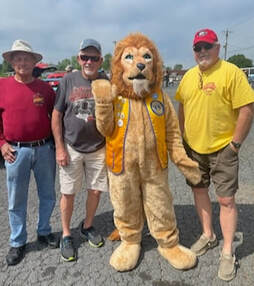 Costumed Lion with Car Show participants